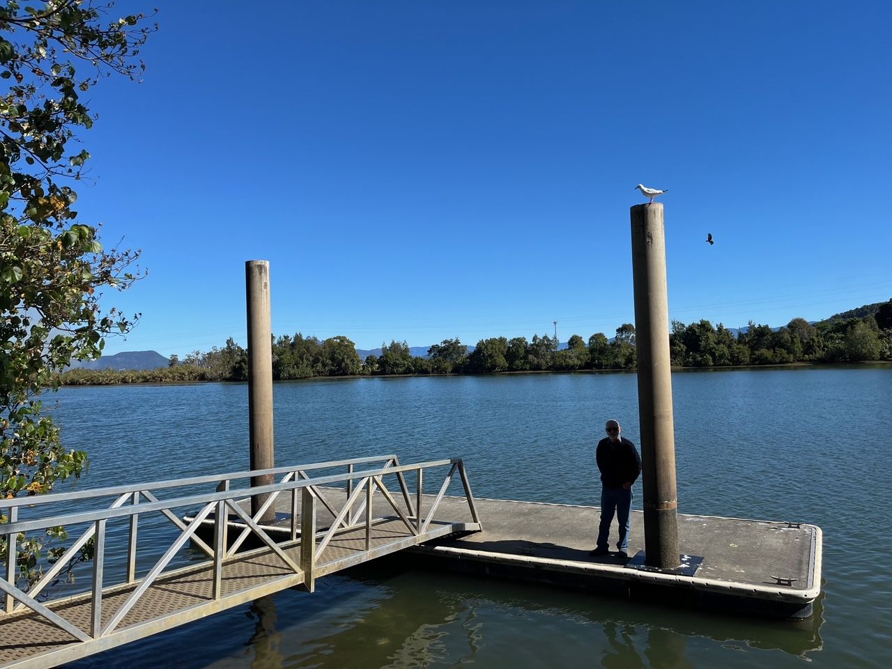 The serene Tweed River today showed its might during the 2022 floods when the pontoon was lifted right off the pylons at a 4.8m flood height