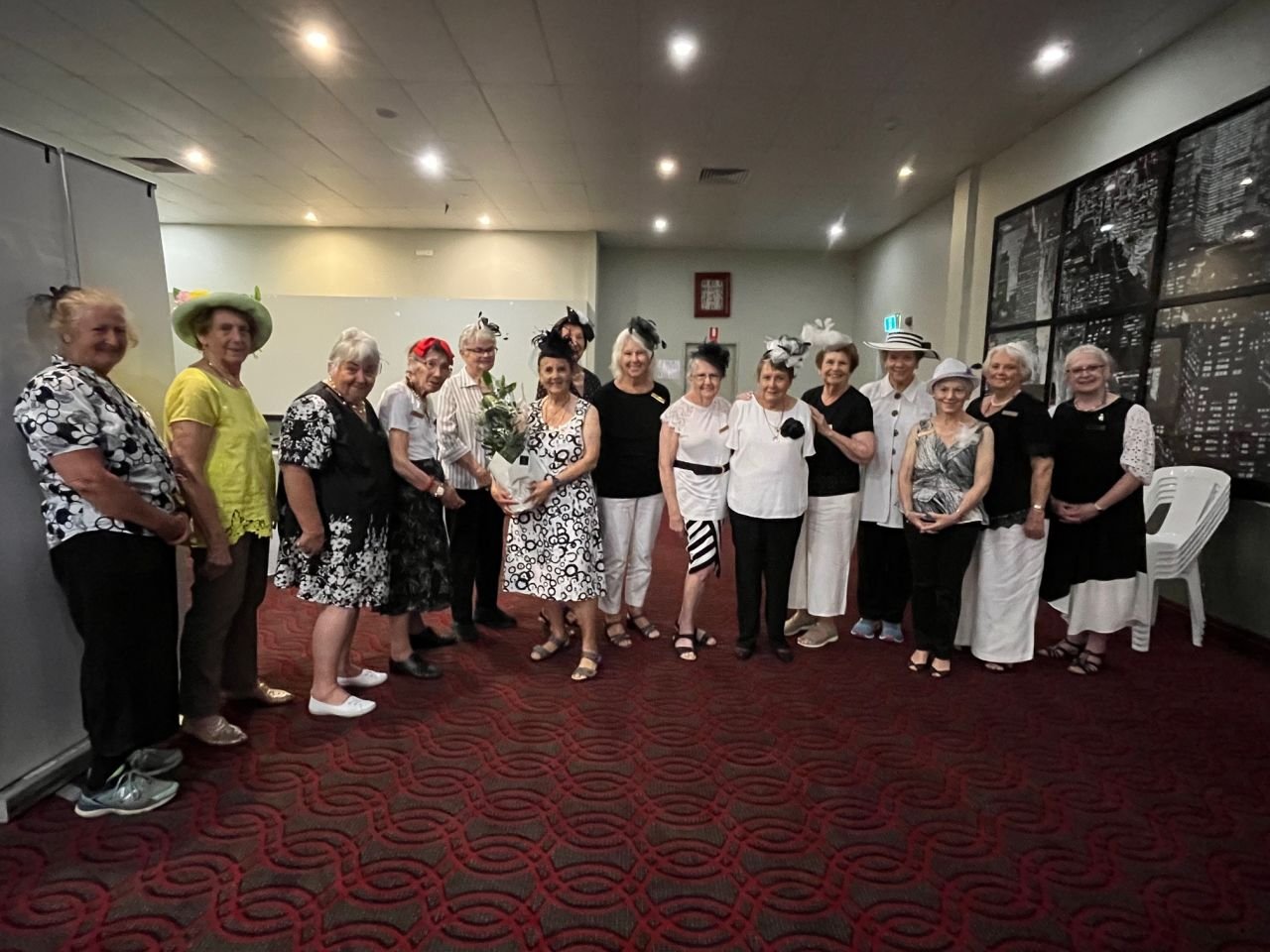 Members dressed in black and white themed Fashions of the Field at our 2024 post-Melbourne Cup November branch meeting