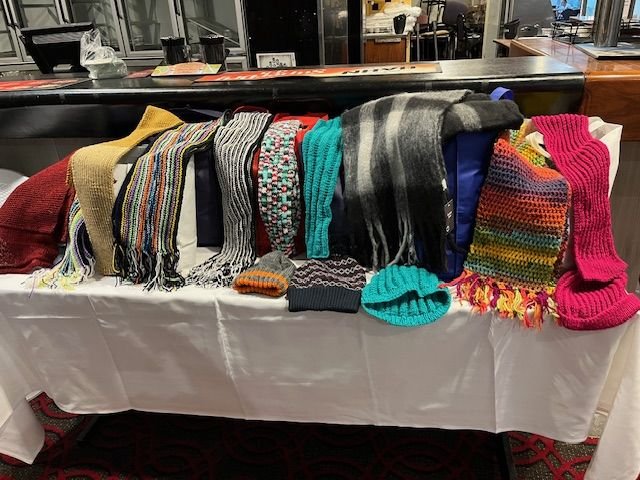 Members supplied scarves, beanies and booties which were donated to the Mission to Seafarers Brisbane during the November 2024 branch meeting