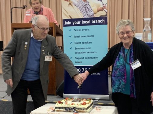 Long time Members Bon Jordan and Roma Cearns cutting the cake