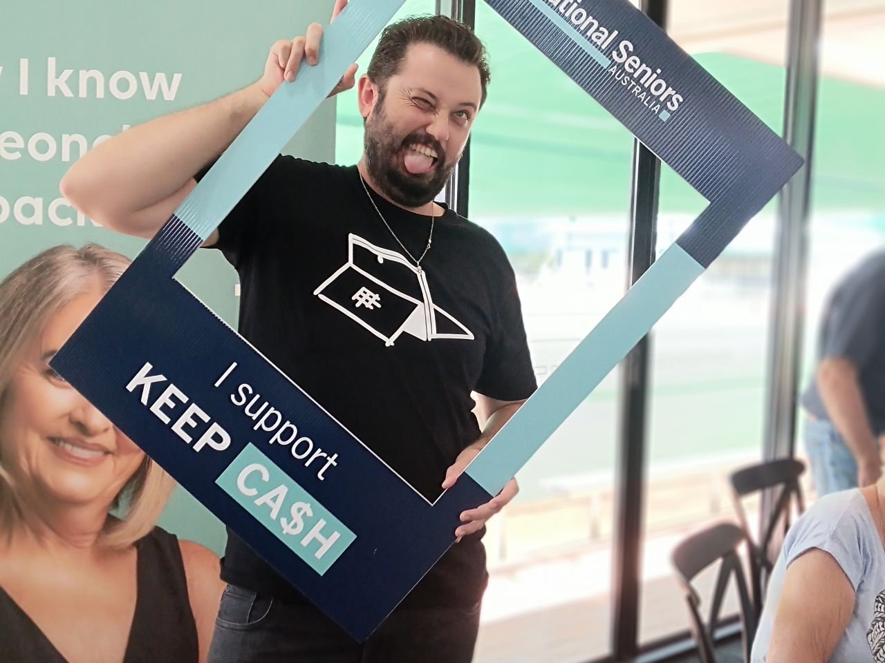 Robbie showing his support for the Keep Cash Campaign at the second Digital Skills Workshop on 11/3/2026.