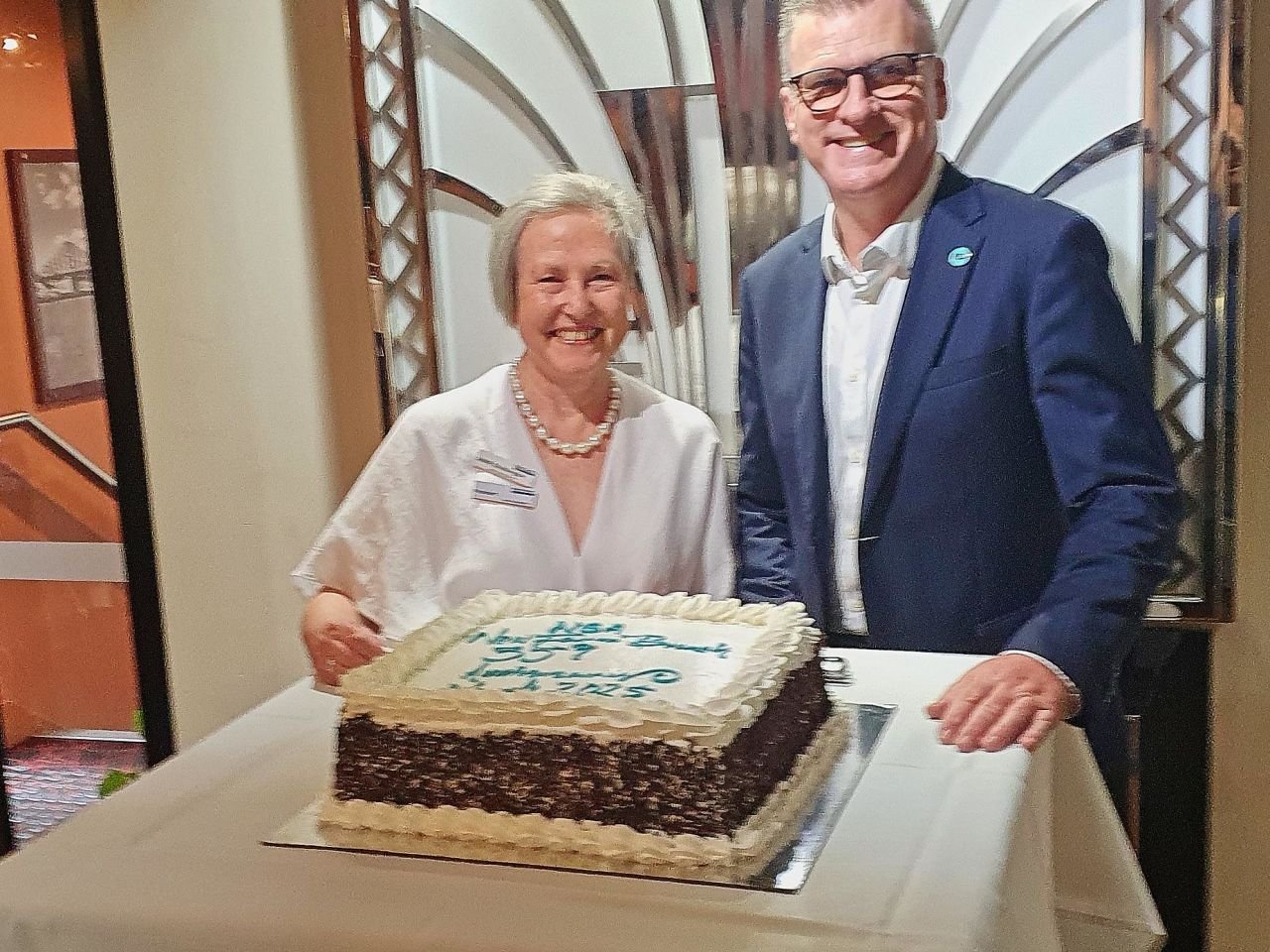 March 2025 General Meeting 

Our CEO Chris Grice and President Anne cutting the Anniversary cake.