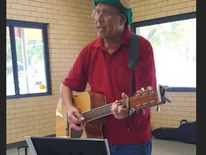 Philip Goes leading the Christmas Carols